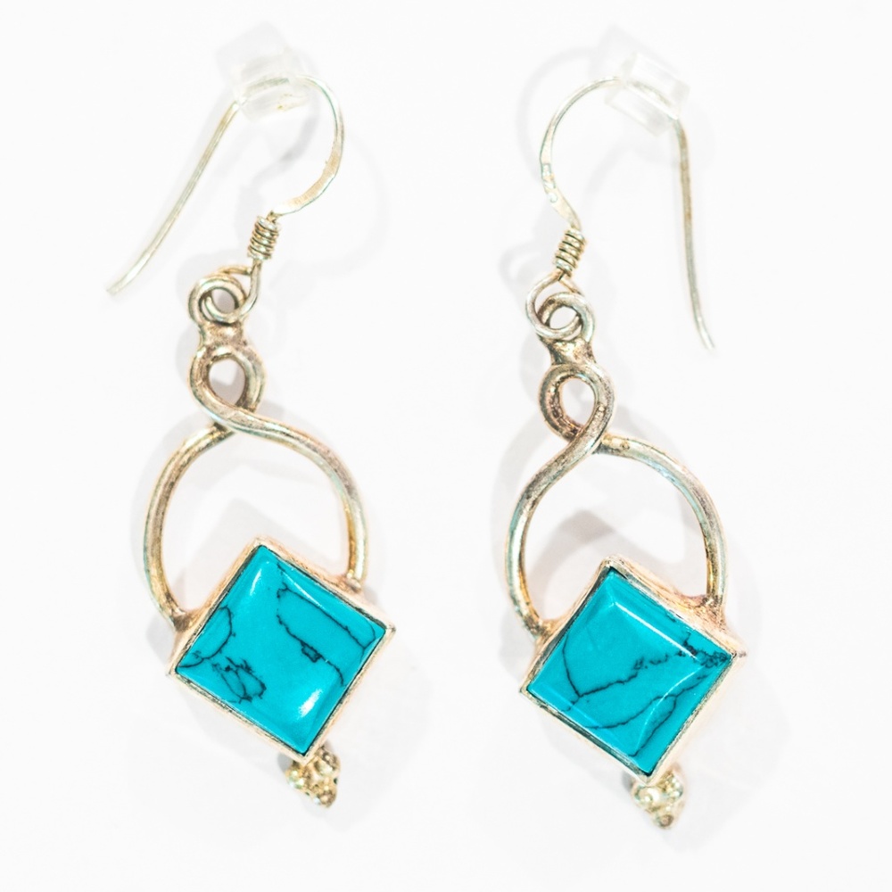 Turquoise square diamond shape earrings.